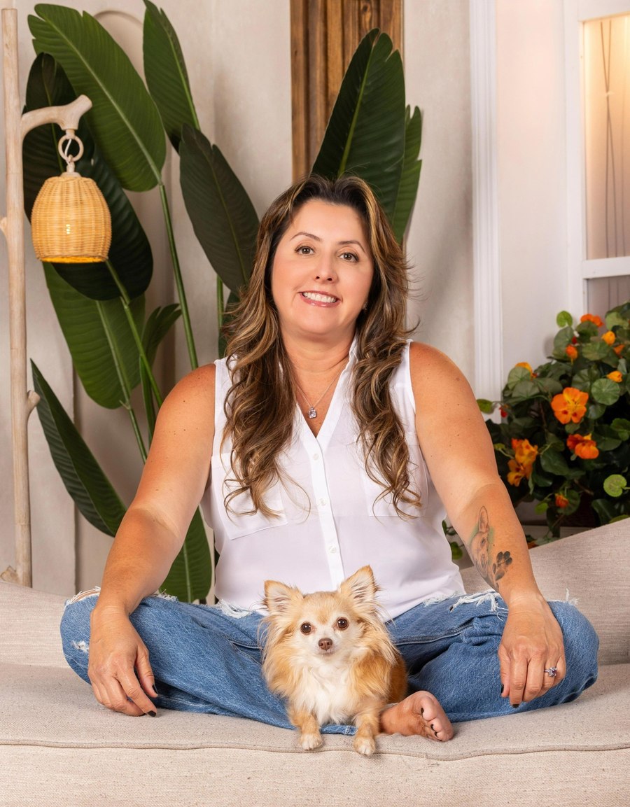 Katt Neuwirth, owner of Kat Walking Dogs, with Mochi her Chihuahua in Hollywood FL